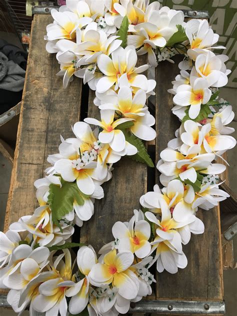 bag of fake flowers for a lei|artificial flower lei.